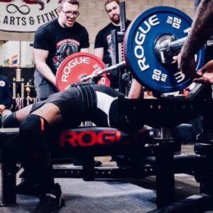 A powerlifting champion from Belleville, breaking a provincial record by bench pressing a significant amount of weight with proper form and technique